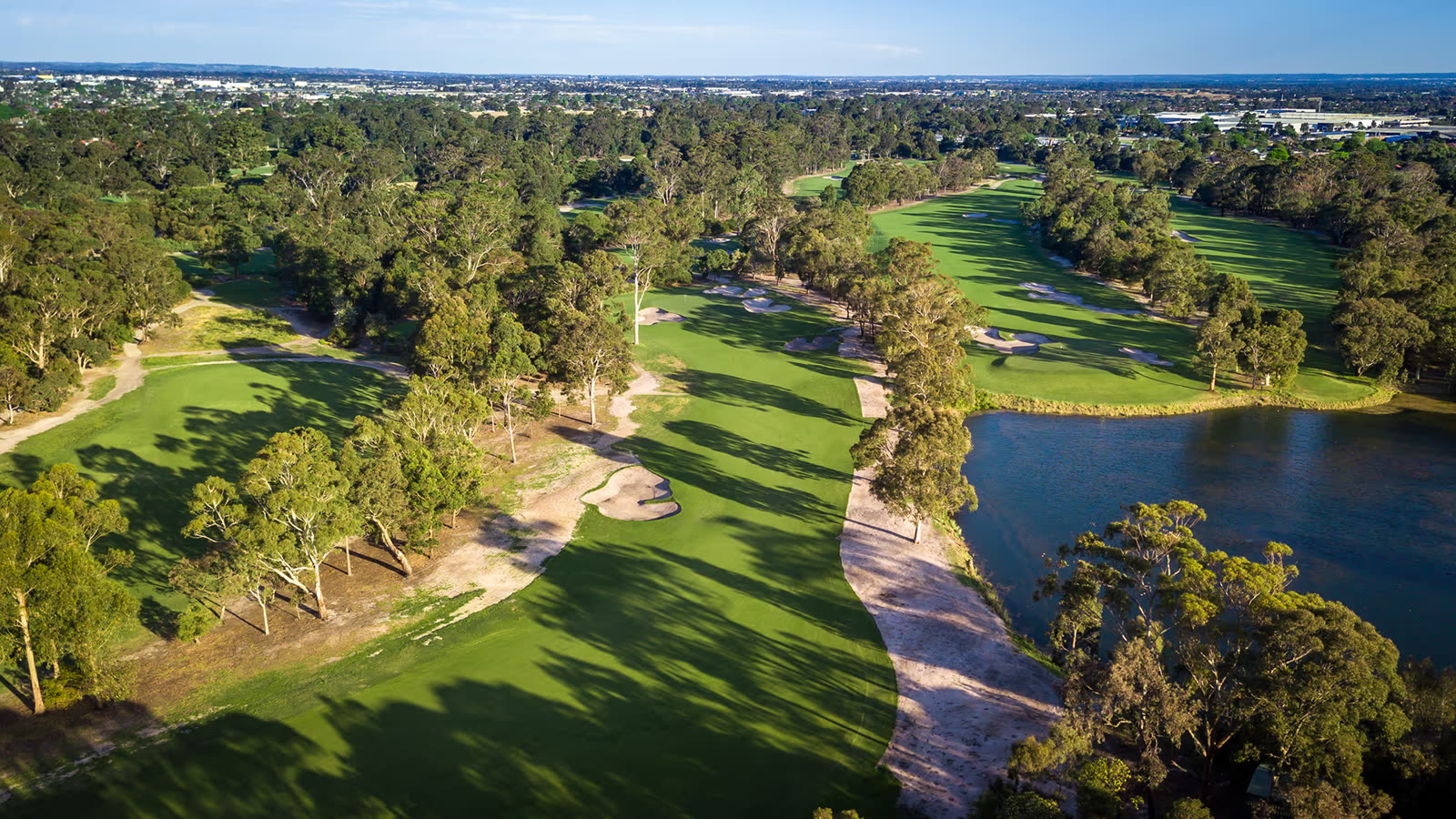 Aerial view of fairways, bunkering and water at Metropolitan Golf Club