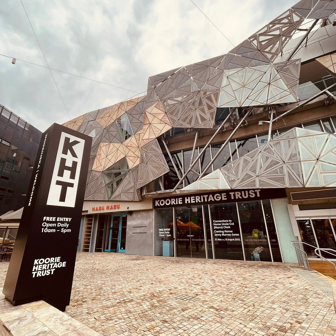 Koorie Heritage Trust entrance at Federation Square, with the KHT sign and geometric facade.