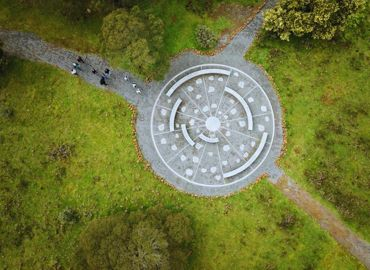 Aerial view of a circular stone arrangement in grassland at Budj Bim, western Victoria.