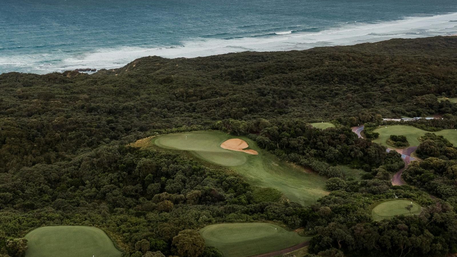 Aerial view of coastal fairways and greens at The National Golf Club, Cape Schanck