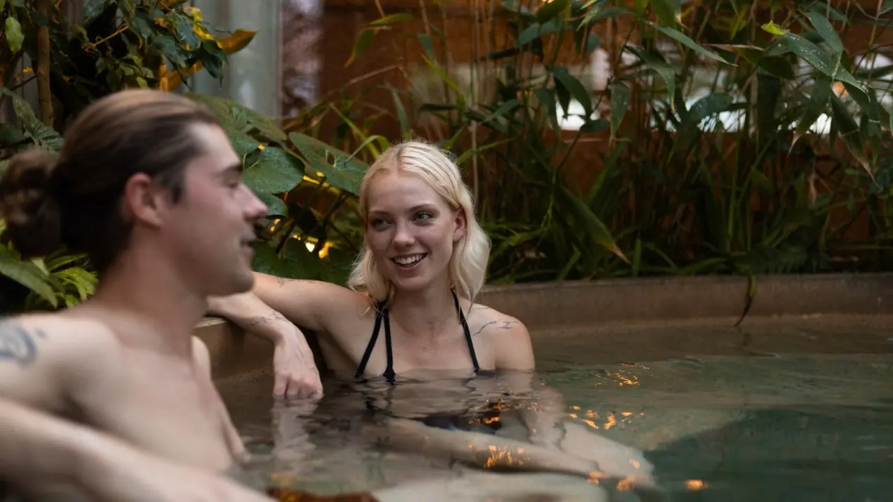 Guests in the plunge pool surrounded by greenery at Inner Studio, Collingwood